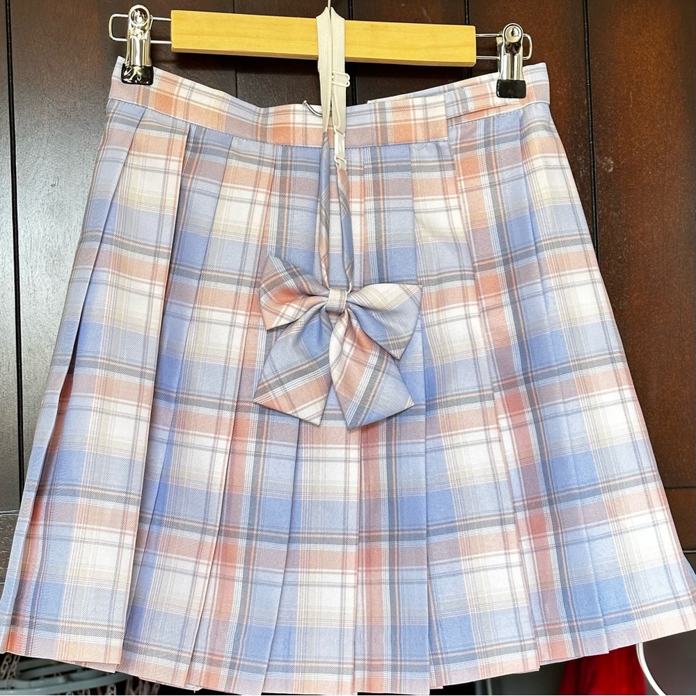 Plaid skirt with bow tie